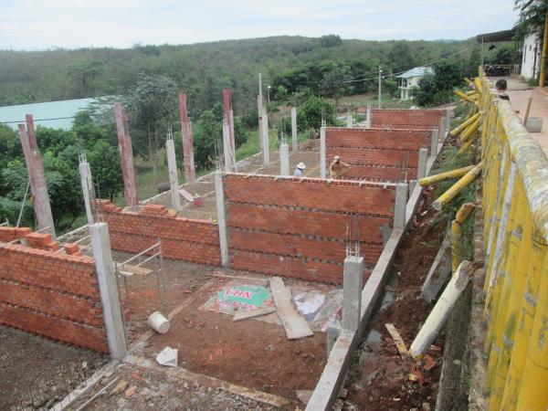 Các dãy phòng ở vẫn chưa hoàn chỉnh - Hình mô tả 1